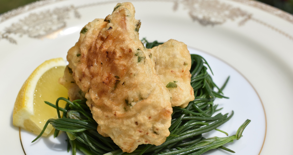 Nancy cooks fish fillets in batter